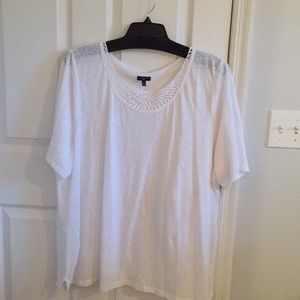 White 100% linen top. Thin/sheer and soft.